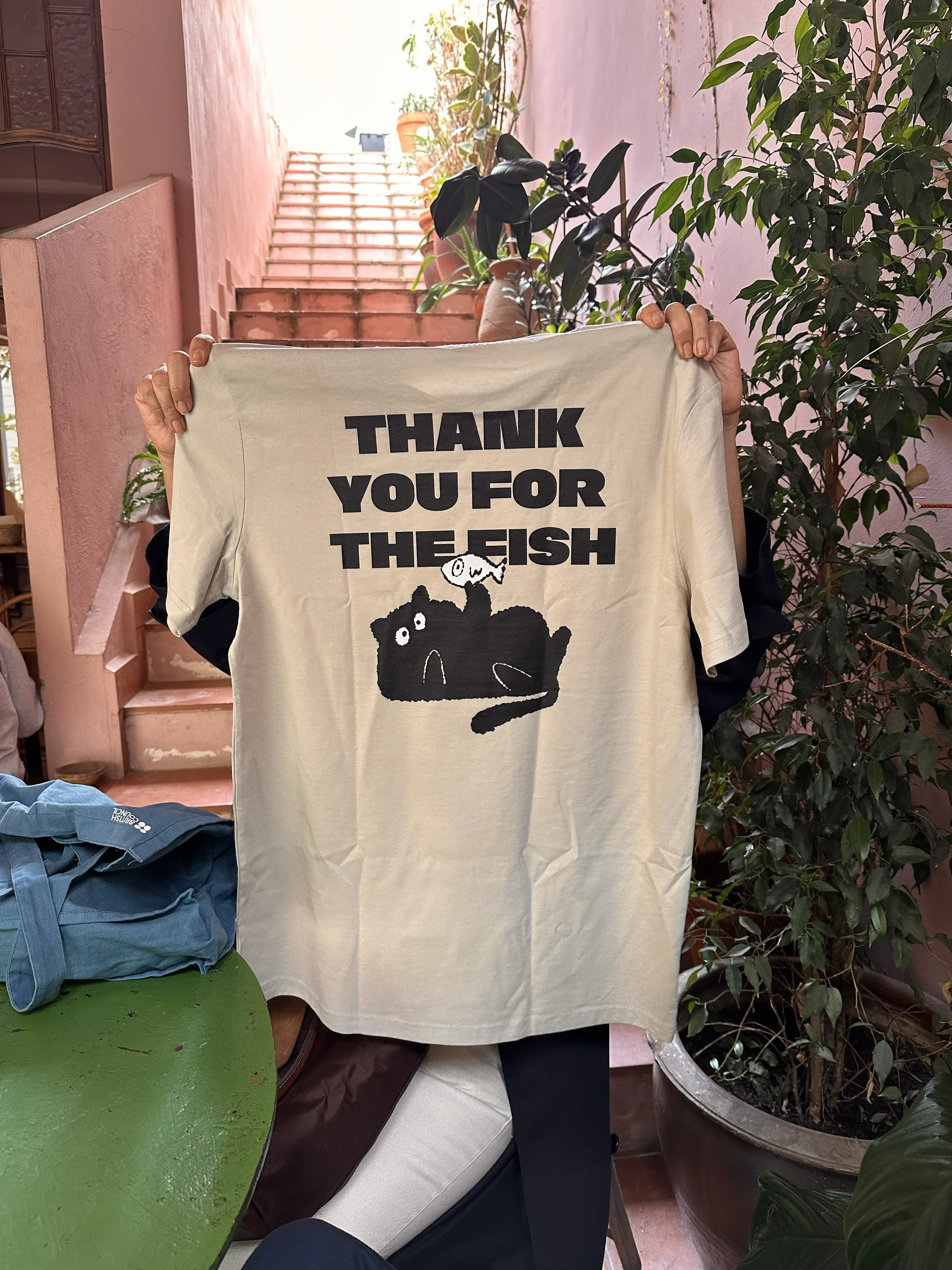 Rumicat — back of the tee: THANK YOU FOR THE FISH, with the cat lying down